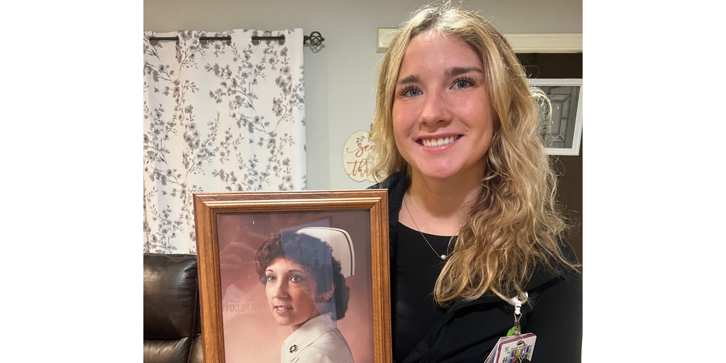 Kyra Sutton holding a picture of her grandmother
