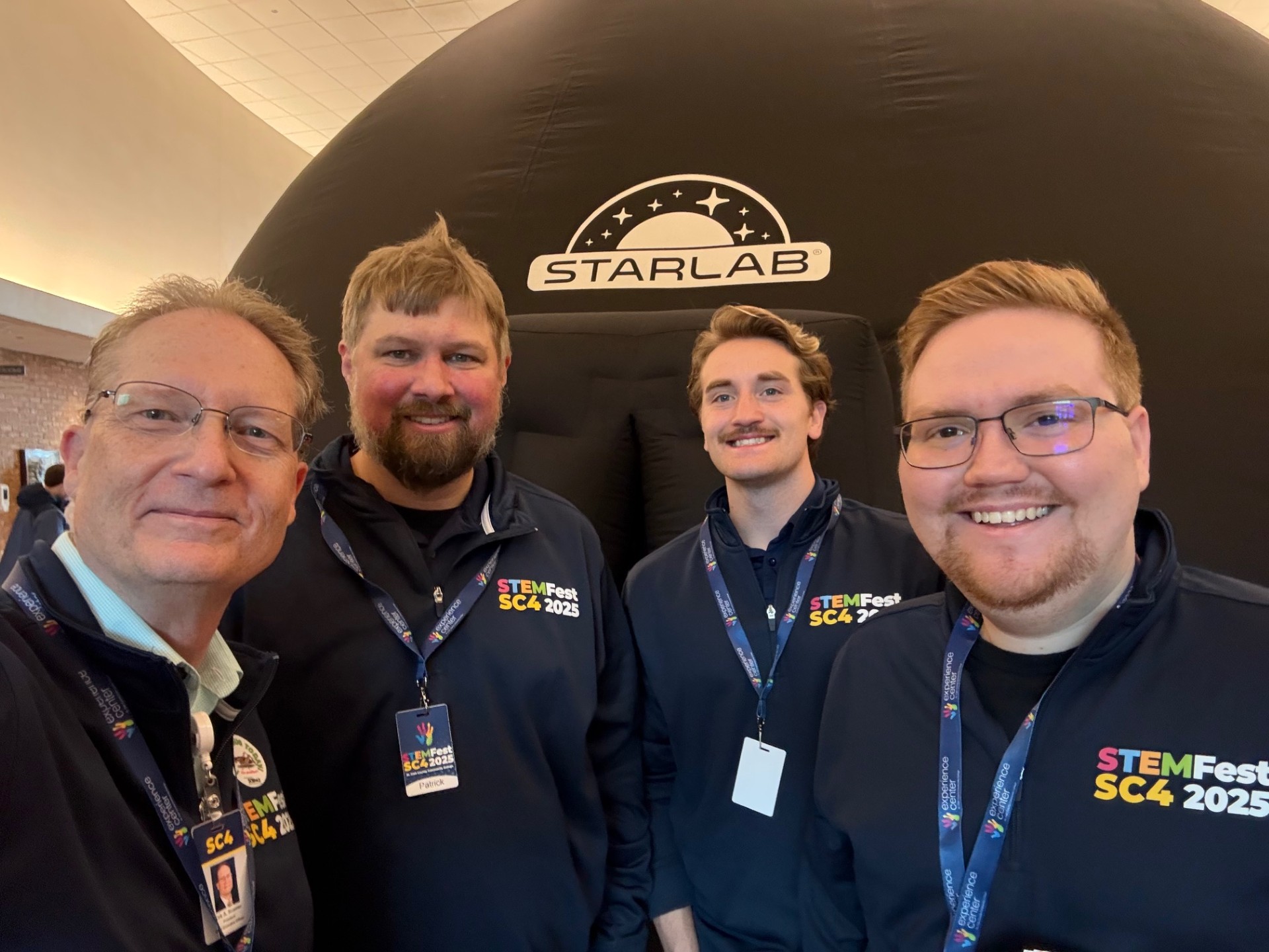 SC4 Staff and Faculty outside the planetarium